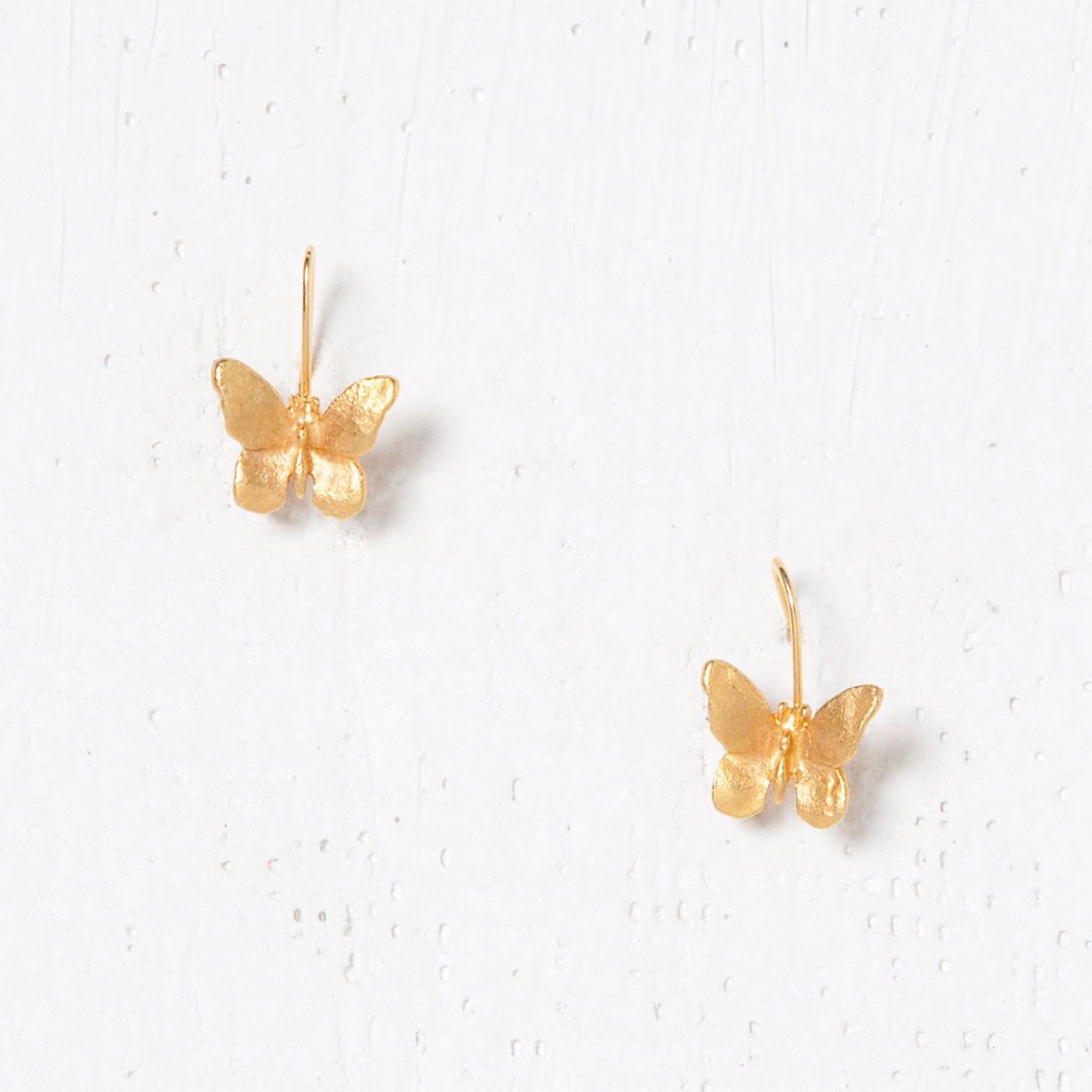 gold earring butterflies